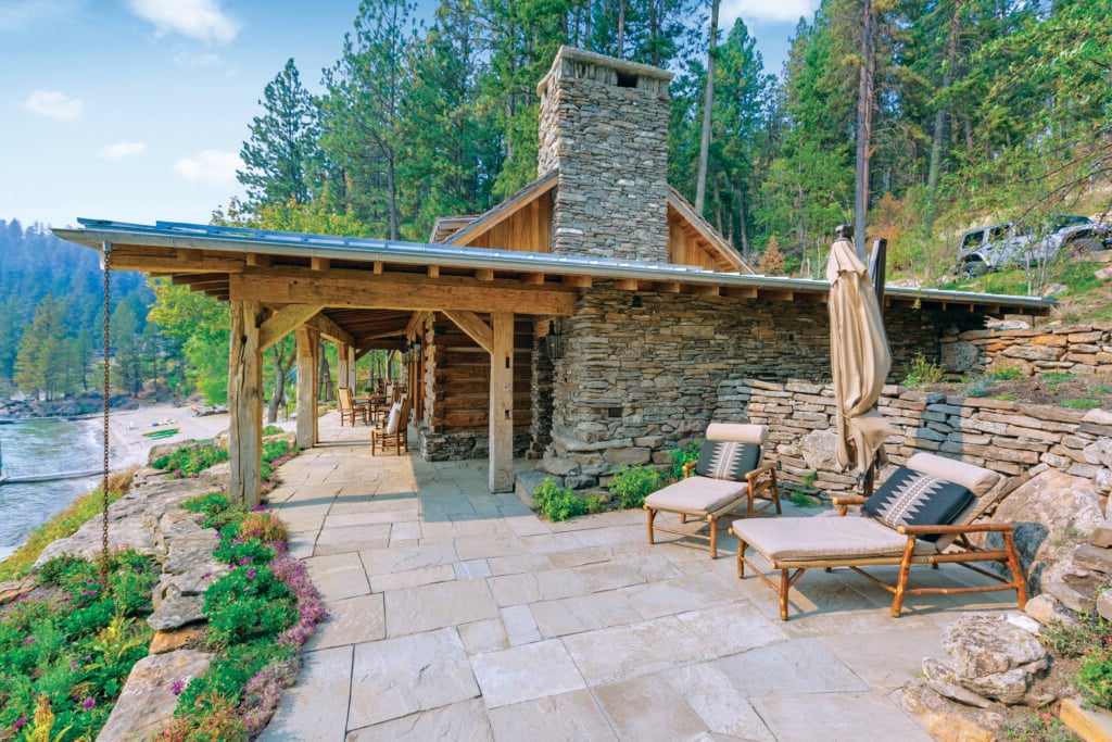 The design team salvaged old barn timbers to build the main cabin that appears constructed in the early 1900s. “The homeowners wanted it to feel old, which meant buying old,” architect Shelli Mittmann says. | Photo: Mike McCall