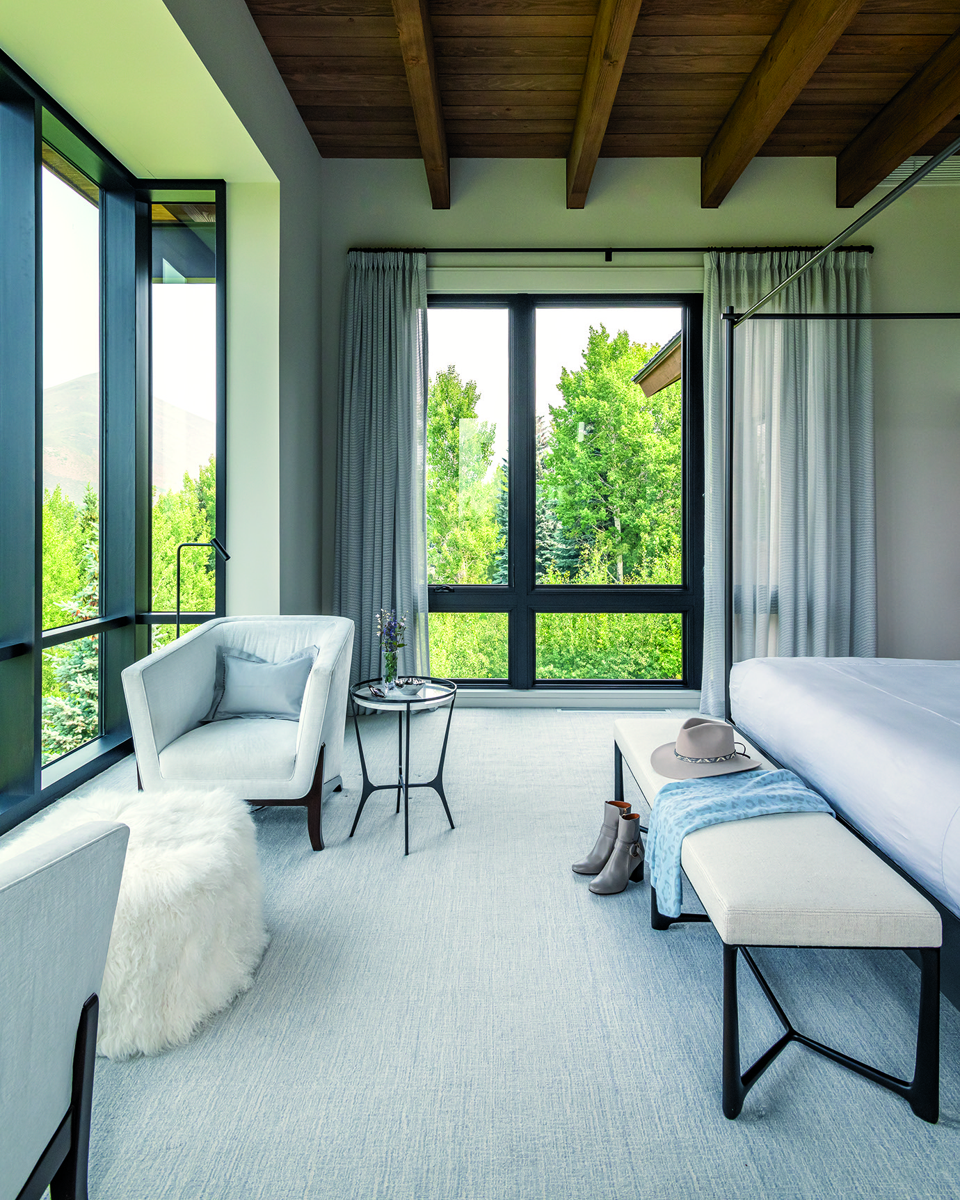 Gisel created a restorative retreat in the primary bedroom with colors that allow the scenery to come right into the room.