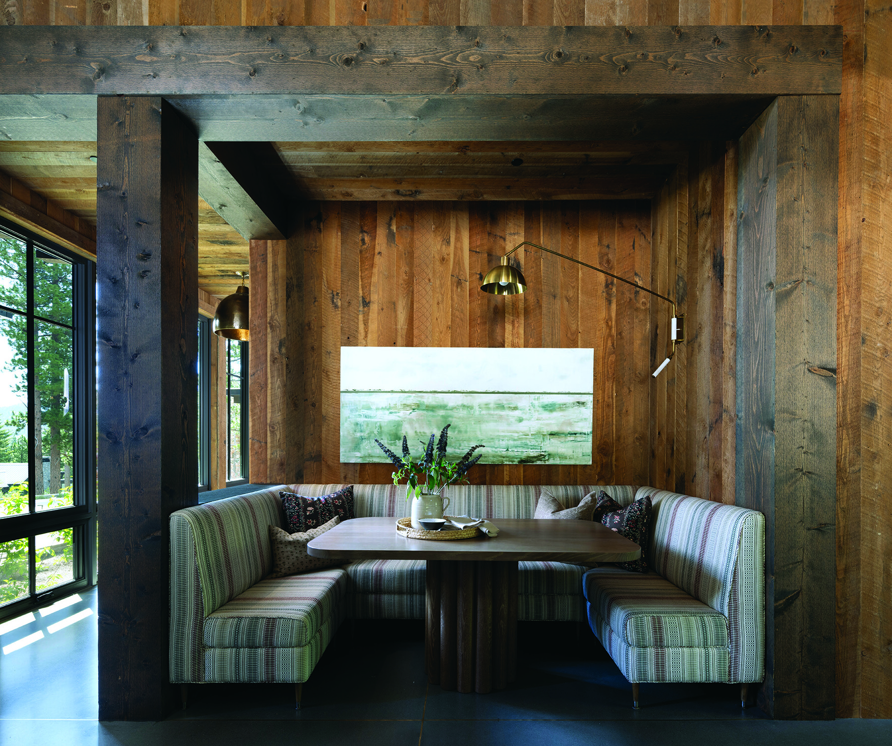 Extra Touch Upholstery covered the banquette with durable Zak&Fox Ophir fabric. S&S Millworks built the white-oak table. | Photo: Paul Dyer